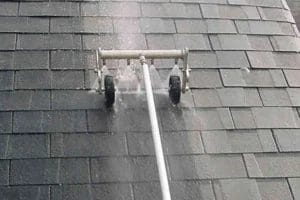 PP Gutters residential roof and gutter cleaning services. A property's roof before being cleaned using softwashing