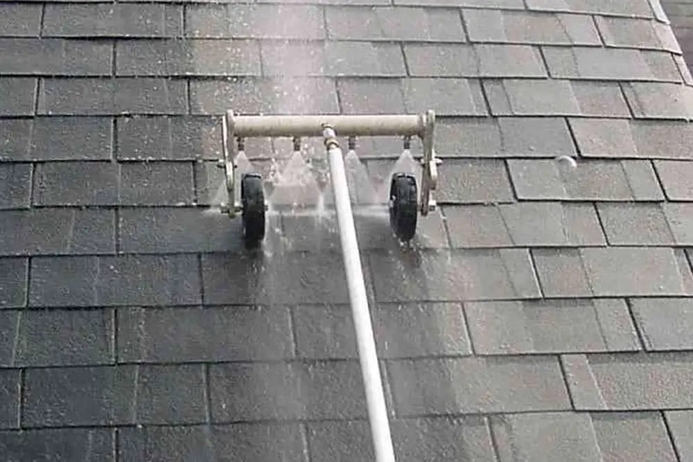 PP Gutters residential roof and gutter cleaning services. A property's roof before being cleaned using softwashing