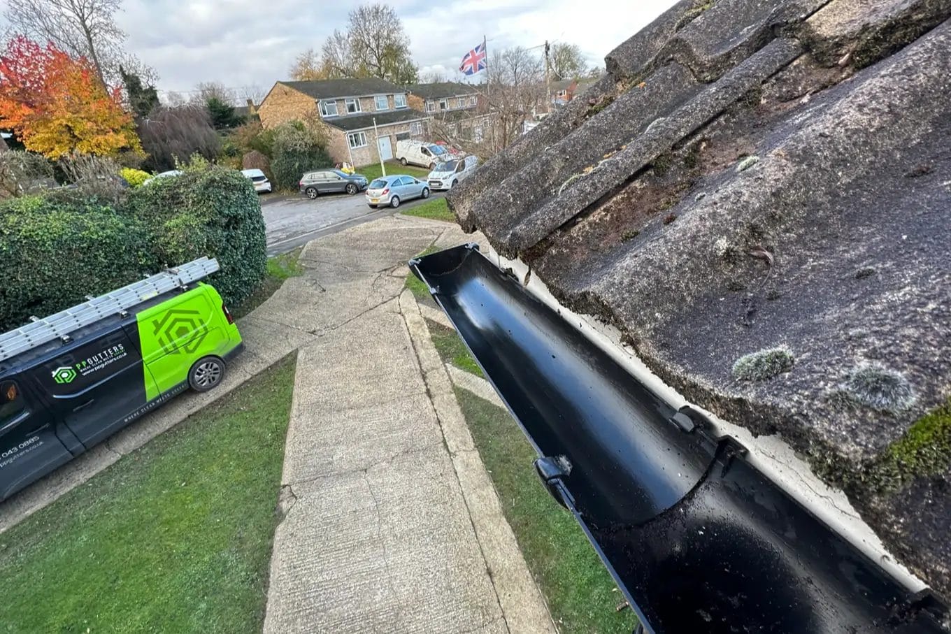 PP Gutters residential gutter cleaning services. Showing a residential property's gutters cleared or debris.