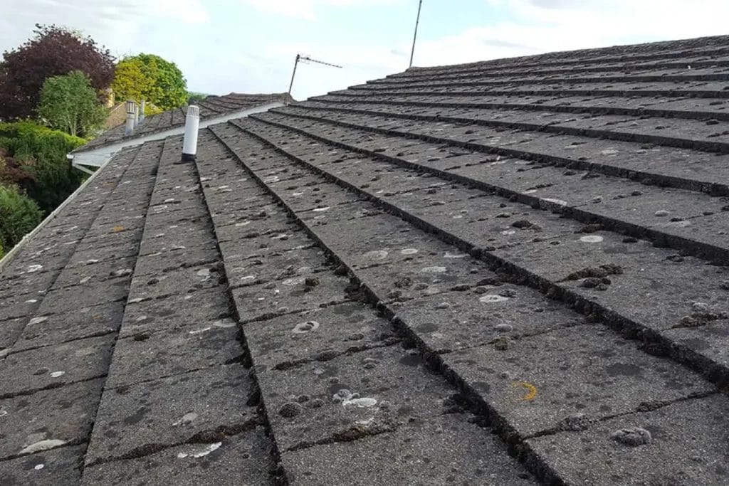 PP Gutters residential roof and gutter cleaning services. A residential property's roof before being clean.