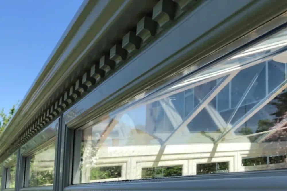 PP Gutters - softwashing services - image of window and gutter after being cleaned