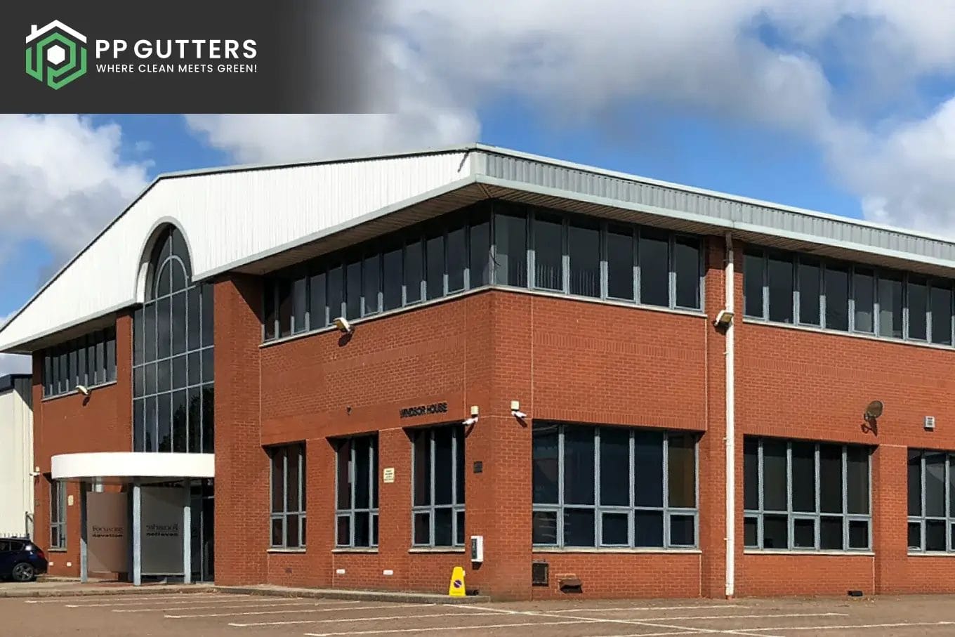PP Gutters commercial roof and gutter cleaning services. Large commercial building