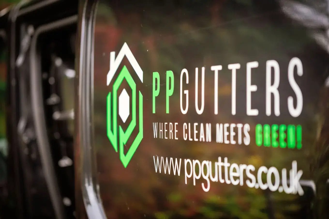 PP Gutters van - close up of van signage. Contact us to book an appointment and get a free quote.