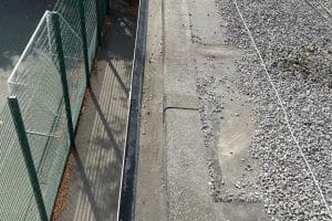 School gutter and roof cleaning in London, Watford and High Wycombe - photo of a flat roof and gutter at Mote School in Fulham, after it's been cleared of debris by PP Gutters.