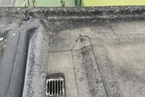 School gutter cleaning in London, Watford and High Wycombe - photo of a flat roof and gutter at Mote School in Fulham, after it's been cleared of debris by PP Gutters.