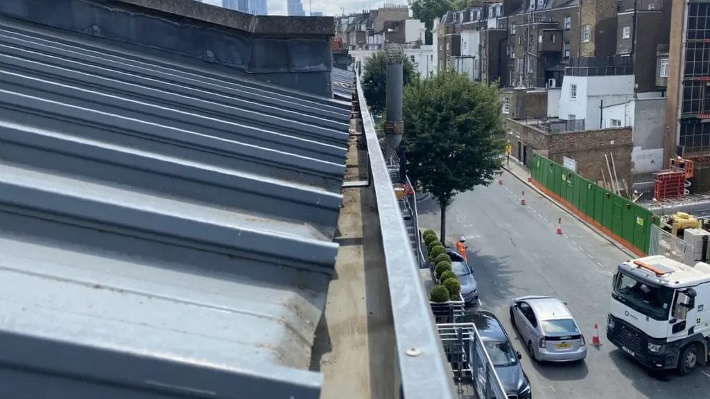 Commercial gutter cleaning in London, Watford and High Wycombe - photo of a gutter in City of Westminster after it's been cleared of leaves by PP Gutters.